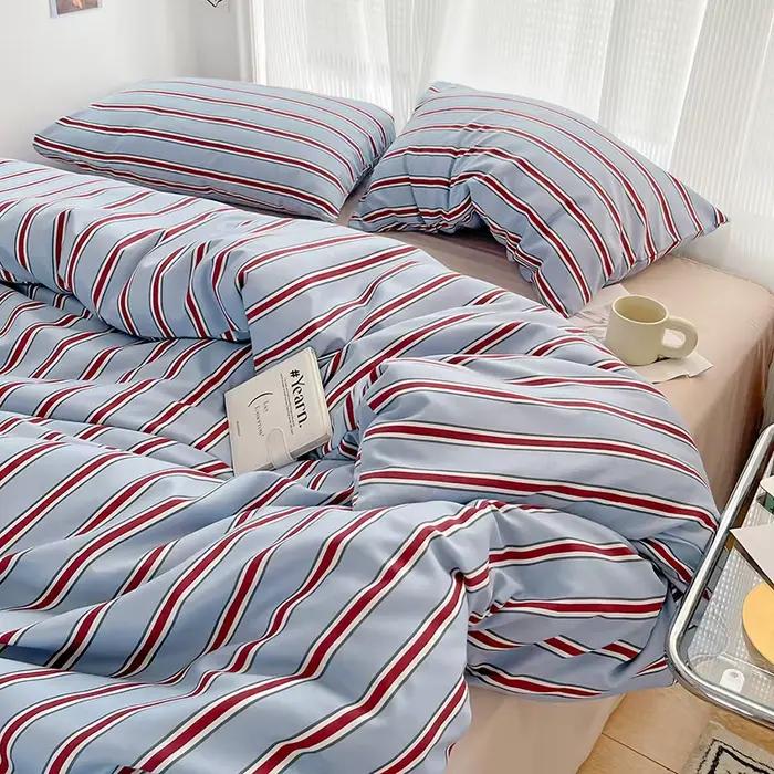 Ensemble de housse de couette rayée rouge et bleue simple, ensemble de draps trois-quatre pièces ave