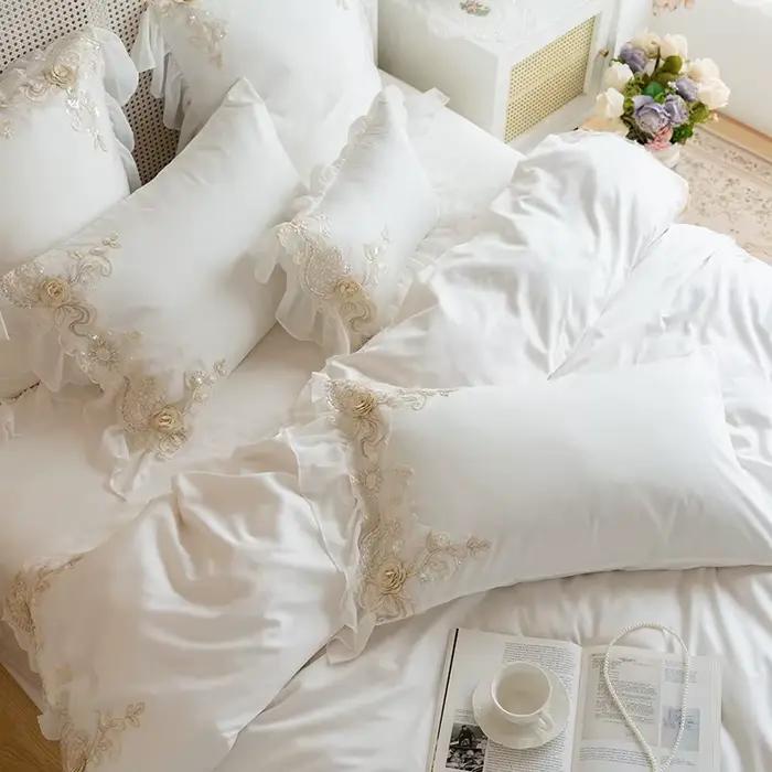 Parure de lit de princesse en dentelle blanche brodée