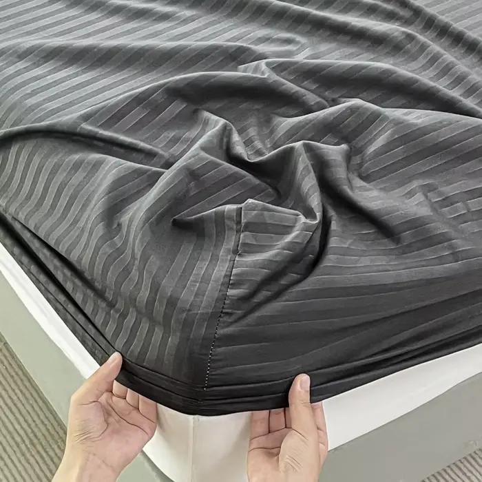 Drap-housse avec bande élastique