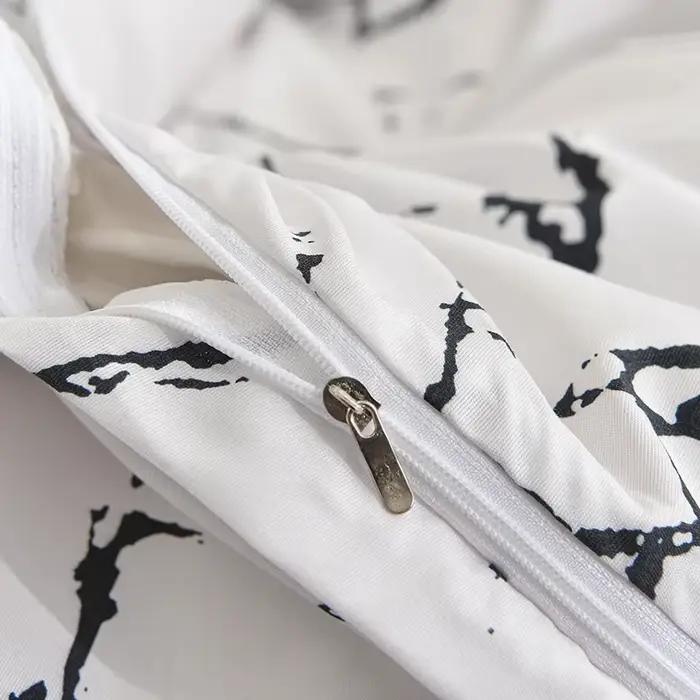 Parure de lit noire et blanche pour lit double