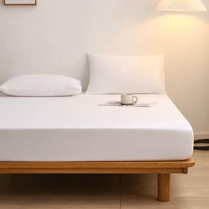 Drap-housse de couleur unie