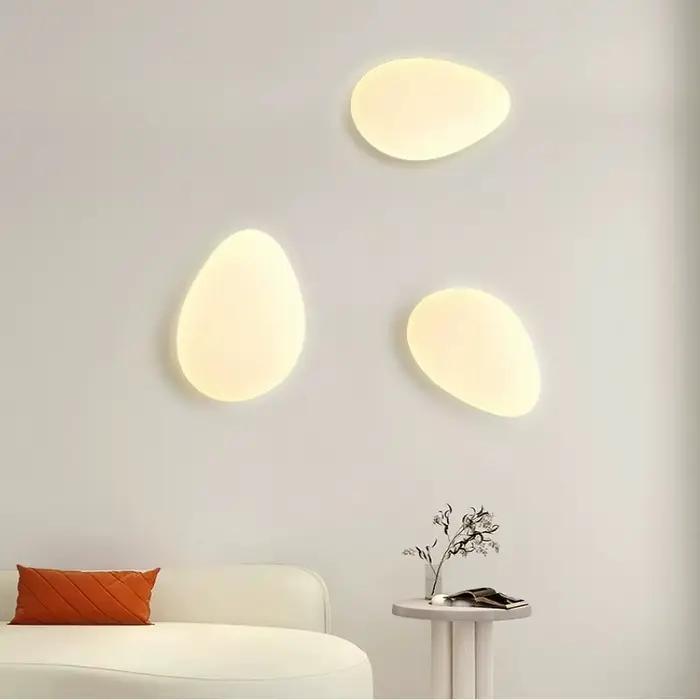 Lampe murale galets salon hôtel fond applique
