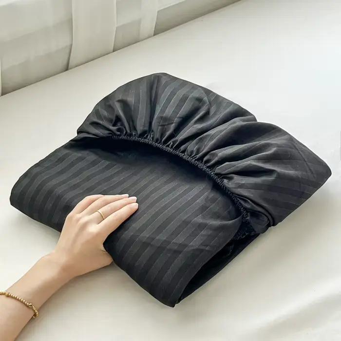 Drap-housse avec bande élastique
